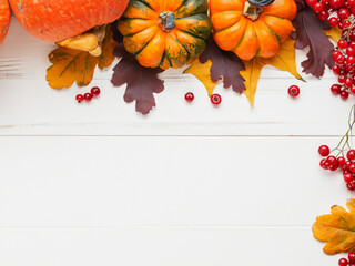 autumn background with pumpkin and leaves