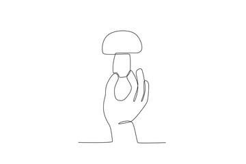 A hand holding mushrooms for diet. World vegan day one-line drawing