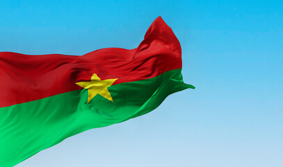 National flag of Burkina Faso waving in the wind on a clear day