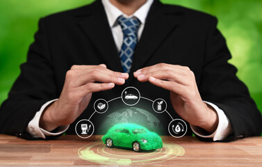 Businessman holding EV car showcase ESG commitment to clean energy for sustainable future and net...