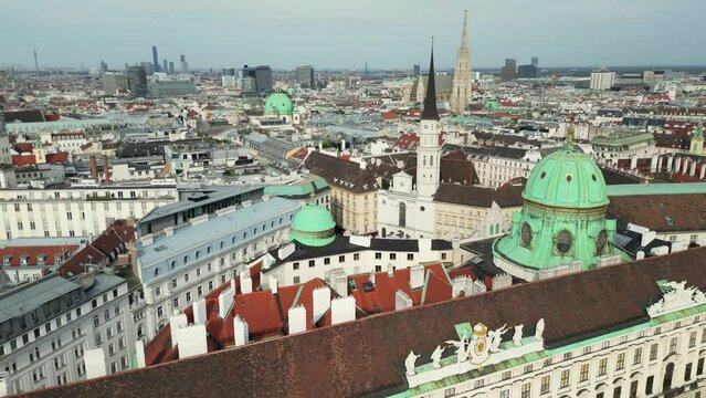 Cathedrals and cityscape City of Vienna, Austria. Roman Catholic Archdiocese of Vienna, Vienna aerial skyline view from drone video. Hofburg Palace and heritage buildings in the Historic Centre