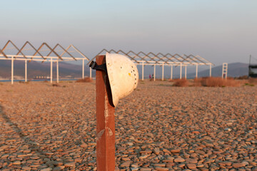 Construction helmet on a post