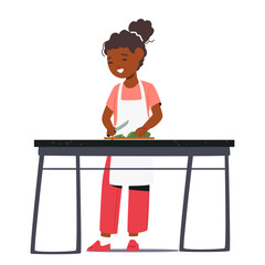 Young Child Joyfully Learning Culinary Skills, African Girl Character Carefully Cutting A Cucumber With Tiny Hands