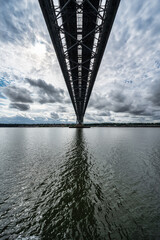 View from below one of the suspension bridges that crosses the sea towards Edinburgh, Scotland.