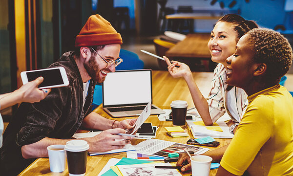 multiracial crew of students having brainstorming session together