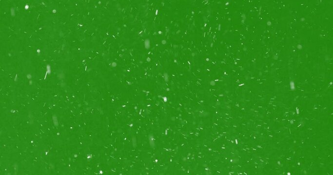 christmas black background with snowflakes falling snow from top on chroma key green