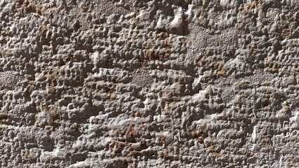 The facade of the house in Portugal is made of cement plaster, painted beige