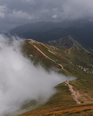 Sunset in High Tatras from Poland side. Amaizing scenery from top of the mountains. You can see Poland and Slovakia countryside meet a chamonix and enjoy hike. Iconic peak is Wielki Giewont.