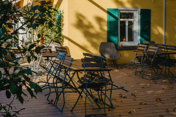 Garden Furniture For Leisure Time In Nature. Empty Chairs And Table Table In Orchard. Wooden Outdoor Furniture Set For Picnic In Autumn Garden. Cozy Interior Courtyard With Table And Chair In Village