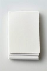 Stack of white cards sitting on top of each other.