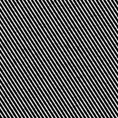 Black distressed diagonal lines on a white background. Irregular jagged edges. Geometric striped ornament. Seamless repeating pattern.