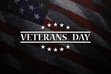 Fototapeta na wymiar Veterans Day inscription on black textured background with USA flag. American holiday poster. Banner, flyer, sticker, greeting card, postcard.
