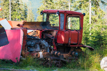 Fototapeta premium old abandoned tractor. broken tractor