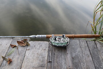 Fishing rod with reel is vintage. Vintage spinning