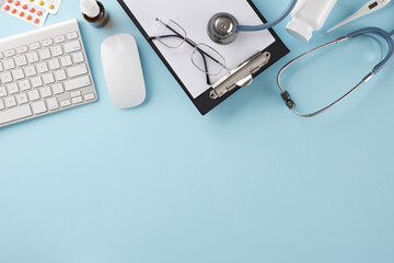 Access healthcare remotely with virtual appointments. Top view of keyboard, computer mouse, stethoscope, clipboard, thermometer, glasses, drugs on soft blue background with promo spot