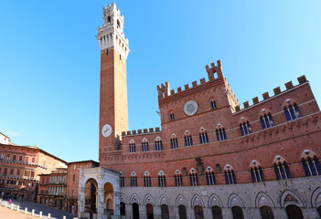 Ancient tower called TORRE DEL MANGIA in the main square of SIENA in central Italy