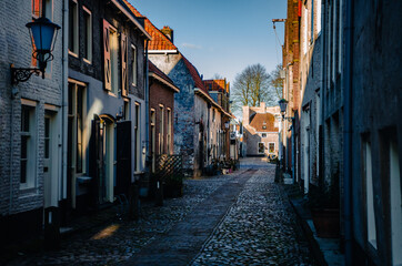 Fototapeta na wymiar narrow old street in the town