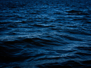 Dark blue water surface.
