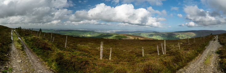 Fototapeta na wymiar Dublin City and the Dublin bay up to Howth as seen from Wicklow Mountains