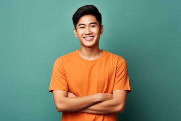 Asian person wearing a modern t-shirt, giving information, index hand pointing to the left, beautiful face, smiling, generative ai - obrazy, fototapety, plakaty