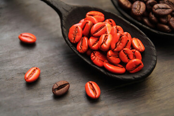 The concept, coffee beans painted red symbolizes the awakening, tonic properties of the coffee drink. Natural coffee is a natural energy drink.