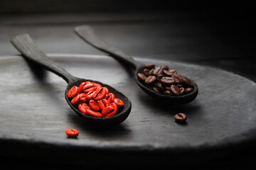 The concept, coffee beans painted red symbolizes the awakening, tonic properties of the coffee drink. Natural coffee is a natural energy drink.
