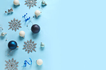 Christmas balls and snowflakes on blue background