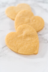 Heart-shaped sugar cookies with royal icing