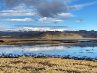 Dyrhólaey view of big glacier Mýrdalsjökull. Dyrhólavegur bridge on south coast of Iceland, near Vik. 