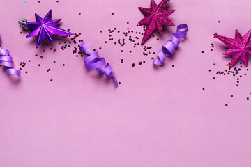 Composition with Christmas decor on purple background