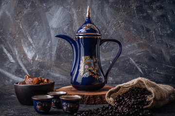 Traditional Arabian Coffee Set and Dates on Grey Background 