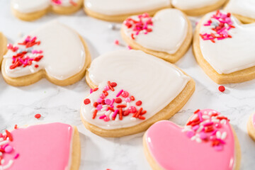 Heart-shaped sugar cookies with royal icing