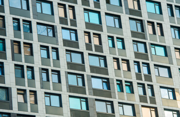 Obraz premium fragment of the facade of a modern building with windows