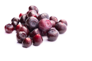 fresh huckleberries on a white background
