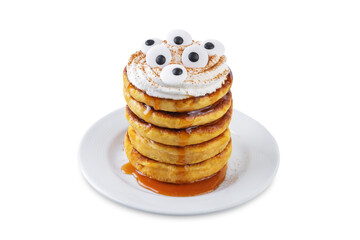 Pumpkin pancakes for Halloween holidays on a white isolated background