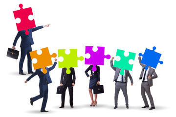 Concept of business people and jigsaw puzzle