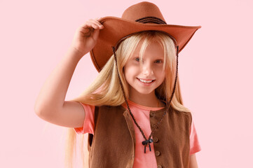Little cowgirl on pink background