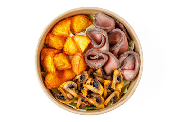 Roast beef and potato salad on a white background, studio shot