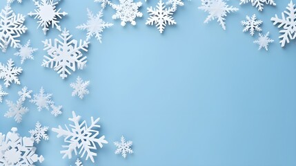 Winter white color decorations with snowflakes on a table. Minimal background.