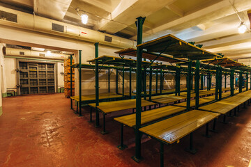 Room for refugees with double-decker beds in a bomb shelter