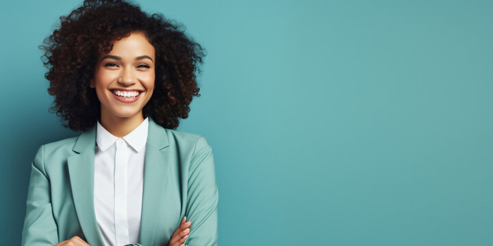 happy, smiling young woman, against a blue background