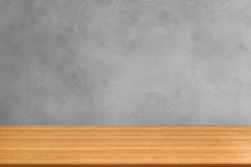 Beautiful empty wooden table. Cement background.