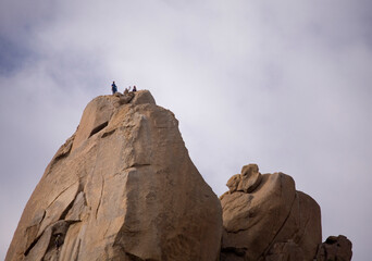 Pinnacle Peak with Four Climbers and Haze
