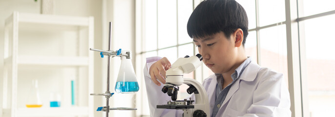 Children scientist learning on biology and chemistry in the laboratory. A STEM education learning...