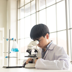 Children scientist learning on biology and chemistry in the laboratory. A STEM education learning...