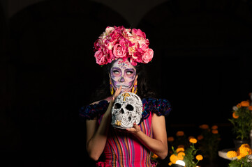 Calavera Catrina sitting on a throne. Sugar skull makeup. Dia de los muertos. Day of The Dead....