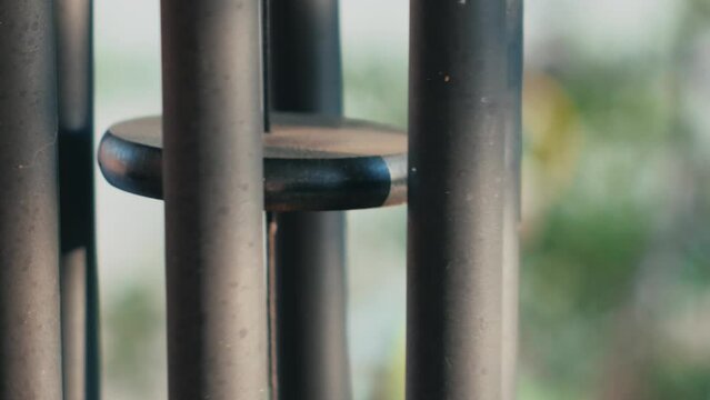 Wind chimes close up moving in the wind 