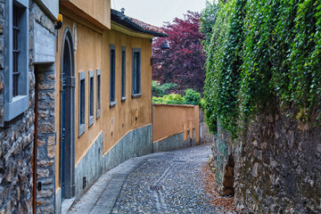 Old pedestrian street as a down from the Upper Bergamo to the Lower Bergamo. Italy.