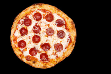 Pepperoni pizza above view on black background