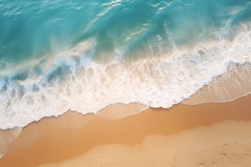 Drone view from top of a sandy beach with waves
